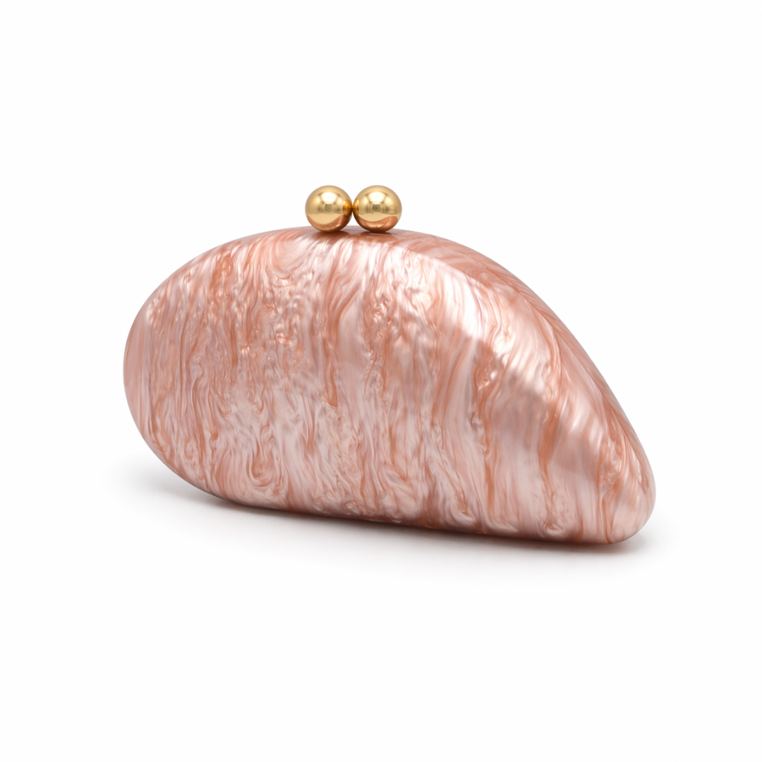L’APOGÉE Alexandria in Rosewood shell-shaped acrylic evening bag featuring soft rosewood marbled tones and a sculptural curved silhouette designed for weddings, dinners, and elegant statement occasion styling.