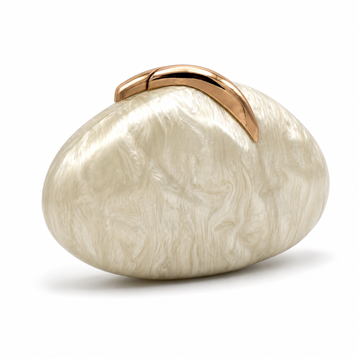 L’APOGÉE Sovana in Ivory acrylic clutch featuring a pearly ivory marbled finish, smooth pebble-inspired silhouette, and sculptural gold metallic handle designed for minimalist luxury evening styling.