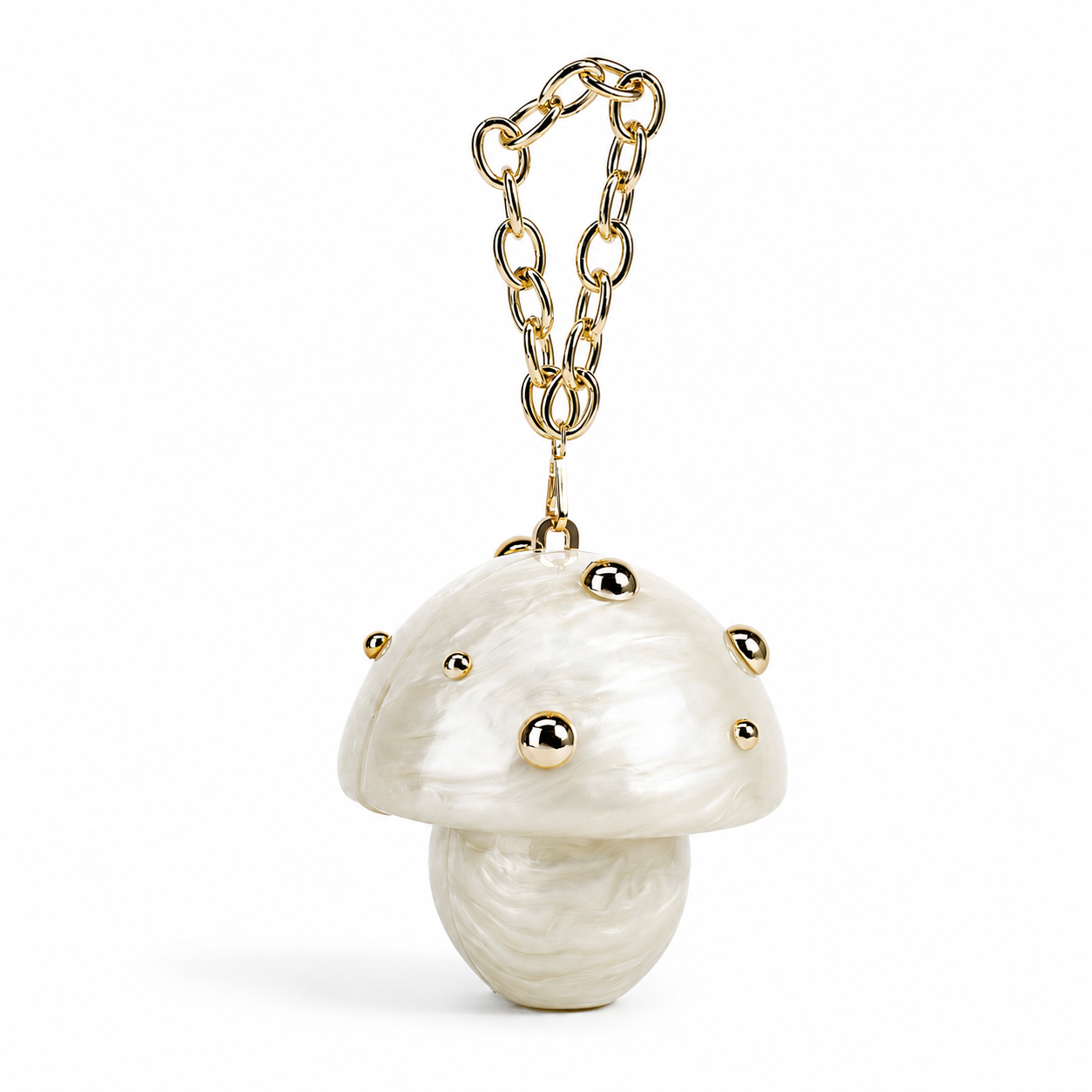 L’APOGÉE Fungo in Ivory sculptural mushroom acrylic clutch featuring pearly ivory marbled textures, gold stud detailing, and a gold chain handle designed for whimsical luxury styling and fashion-forward evening looks.