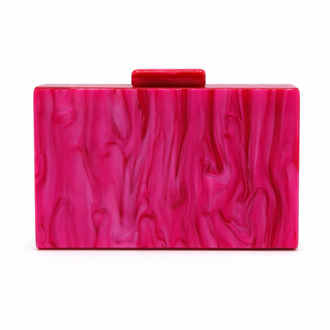 L’APOGÉE Spark rectangular acrylic clutch featuring multicolor marbled tones in pink, blue, yellow, ivory, and lilac with a bold sunburst design created for parties, fashion events, and statement styling.