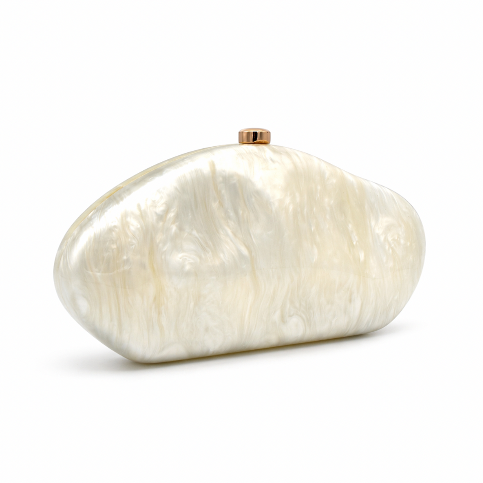 L’APOGÉE Moon in Ivory sculptural acrylic evening bag featuring a futuristic metallic design for weddings, formal events, and statement occasion styling.