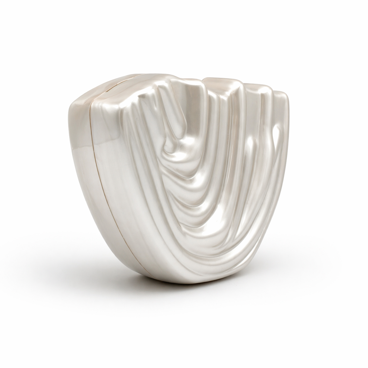 L’APOGÉE Drapée in Pearl sculptural acrylic clutch featuring pearly ivory finishes, flowing carved textures, and an artistic organic silhouette designed for bridal styling, elegant evenings, and contemporary luxury fashion moments.