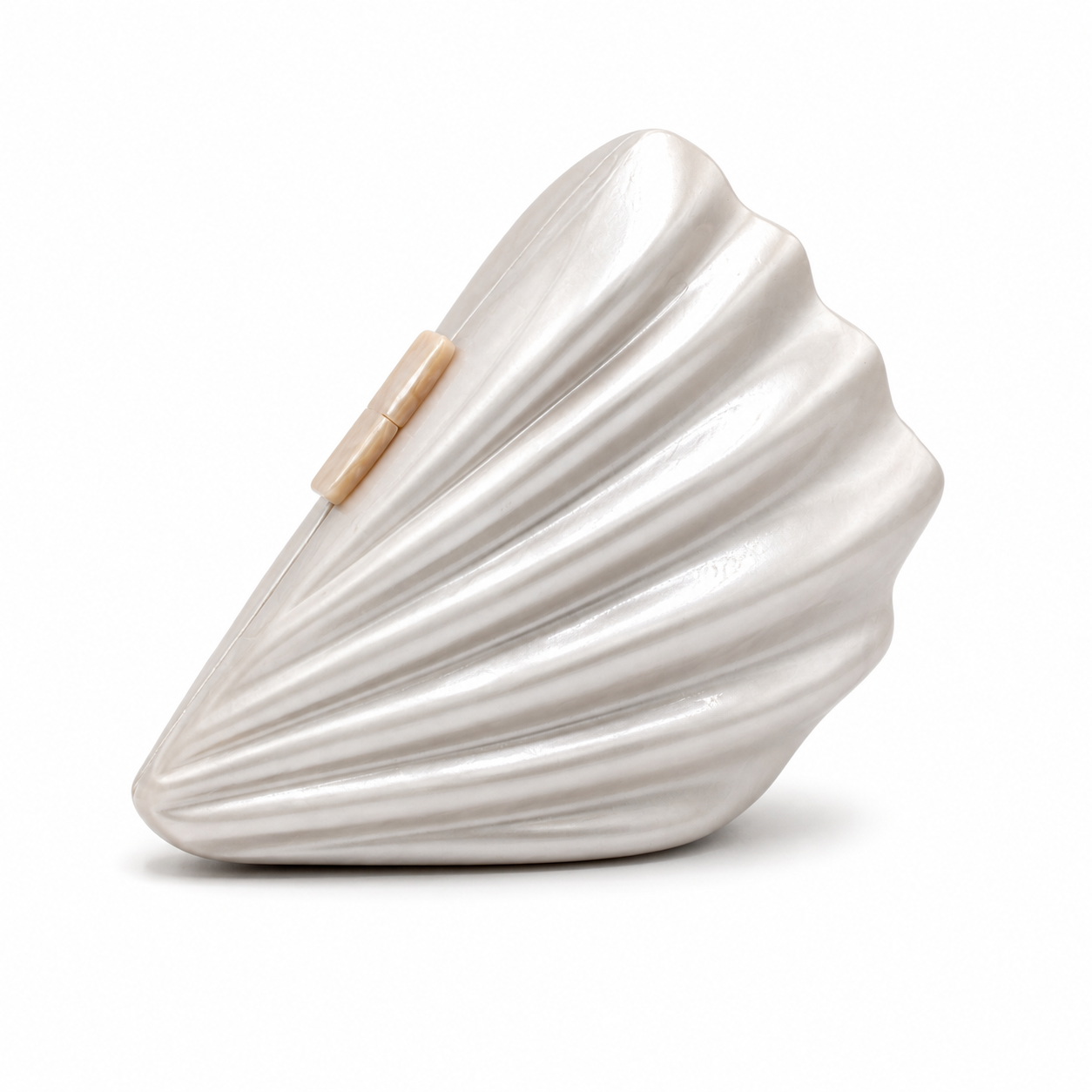 L’APOGÉE Atlantis pearly silver shell-shaped evening bag inspired by ocean elements designed for weddings, vacations, formal events, and elegant statement occasion styling.