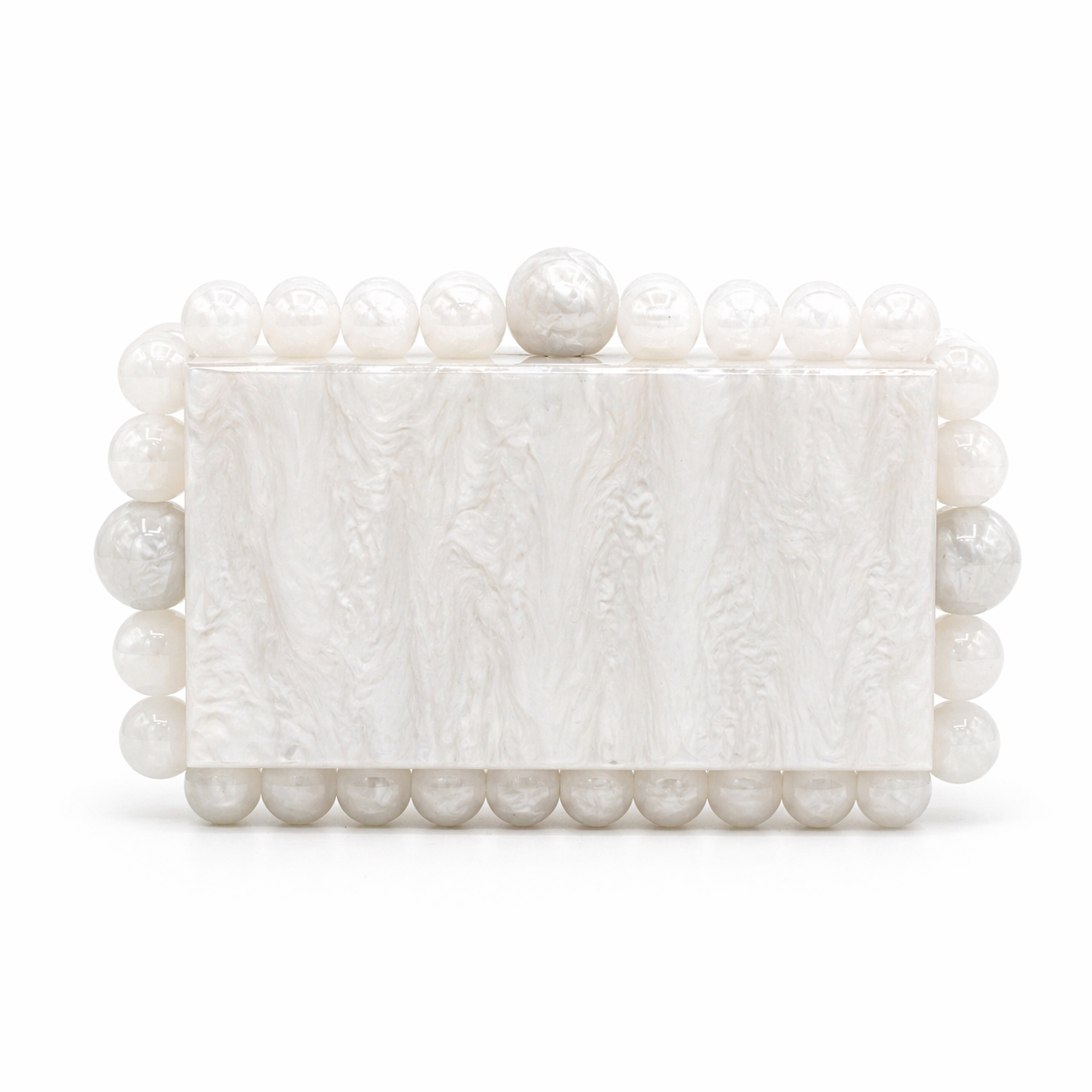 L’APOGÉE Boba in White acrylic evening bag featuring pearly white marbled finishes, sculptural pearl-inspired bead detailing, and a structured rectangular silhouette designed for bridal styling and elegant luxury occasions.