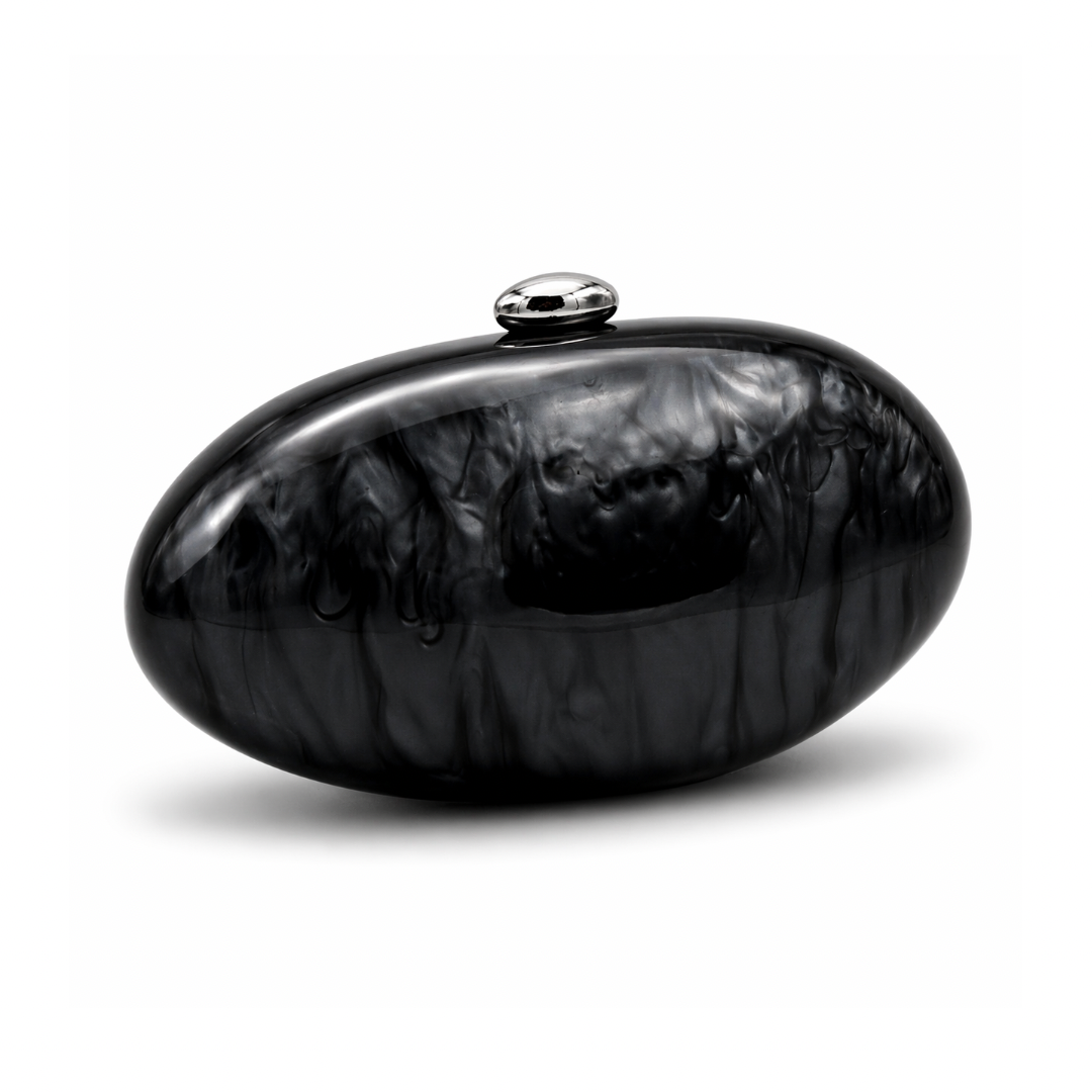 L’APOGÉE Calypso in Black sculptural oval acrylic evening bag featuring glossy black tones and a rounded statement silhouette designed for formal events, evening dinners, and elegant night styling.