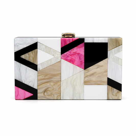 L’APOGÉE Museo rectangular acrylic clutch featuring geometric marbled panels in ivory, beige, black, and fuchsia pink designed for parties, fashion events, and artistic statement styling.