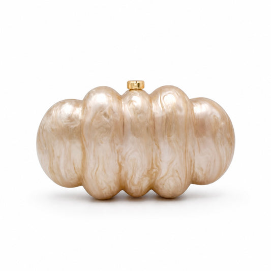 L’APOGÉE Nimbus in beige cloud-inspired acrylic clutch featuring an beige finish designed for weddings, formal events, and elegant occasion styling.