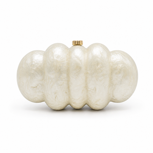 L’APOGÉE Nimbus in Ivory cloud-inspired acrylic clutch featuring an ivory pearl finish designed for weddings, formal events, and elegant occasion styling.