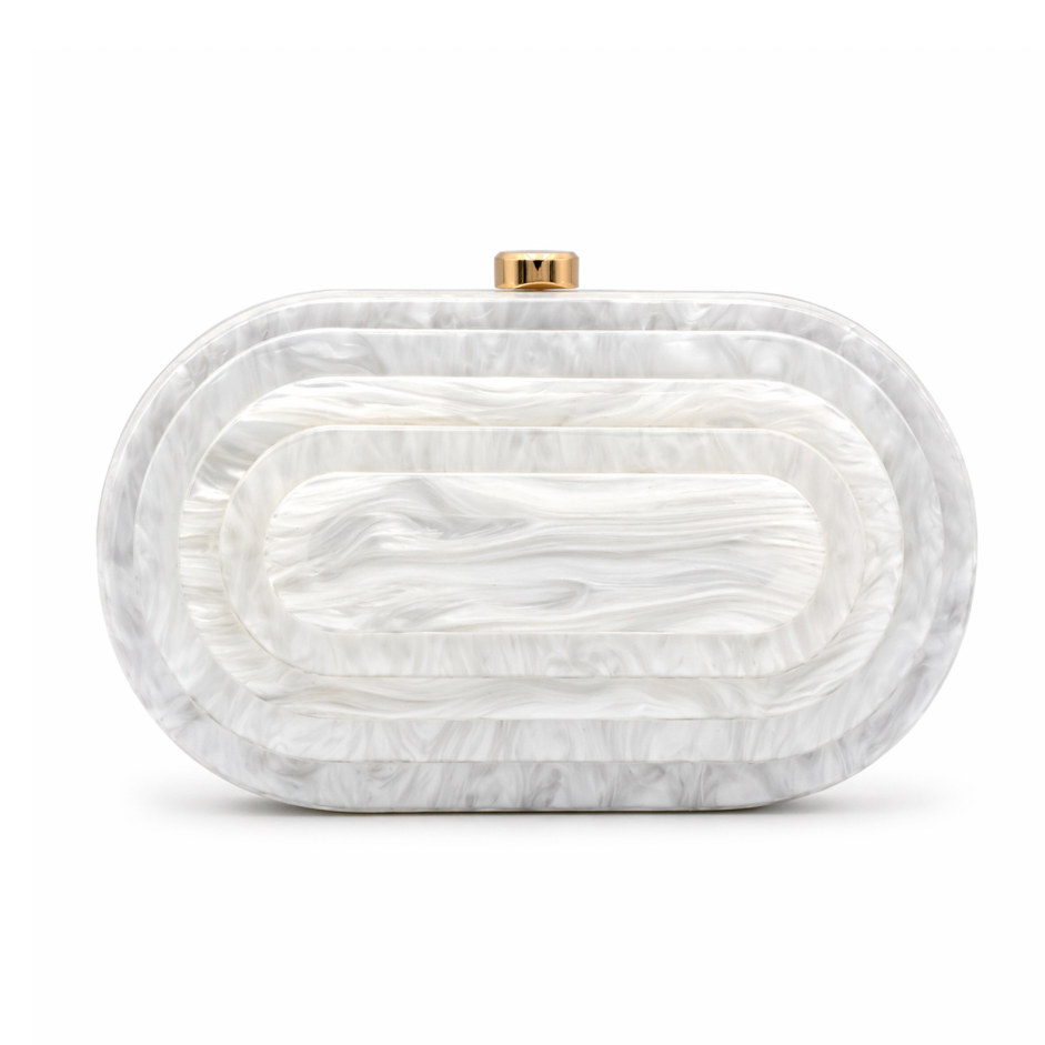 L’APOGÉE Olympia in White layered oval acrylic clutch featuring glossy white marbled tones and a sculptural concentric silhouette designed for weddings, formal events, and elegant evening styling.