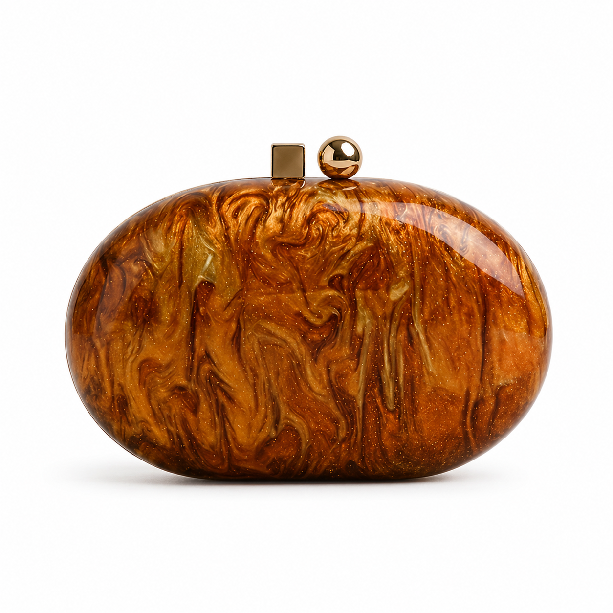 L’APOGÉE Ombrée oval acrylic clutch featuring rich caramel brown and amber marbled textures, a glossy sculptural silhouette, and gold metallic clasp detailing designed for elegant evening styling and luxury fashion moments.