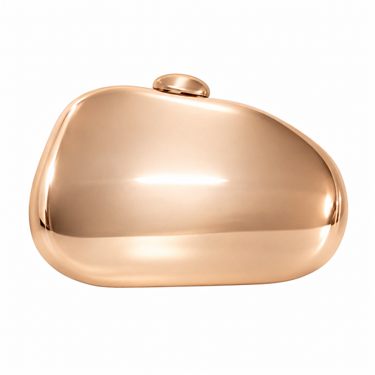 L’APOGÉE Reflection in Rose Gold metallic evening bag featuring a sculptural rose gold design for weddings, formal events, and elegant statement styling.