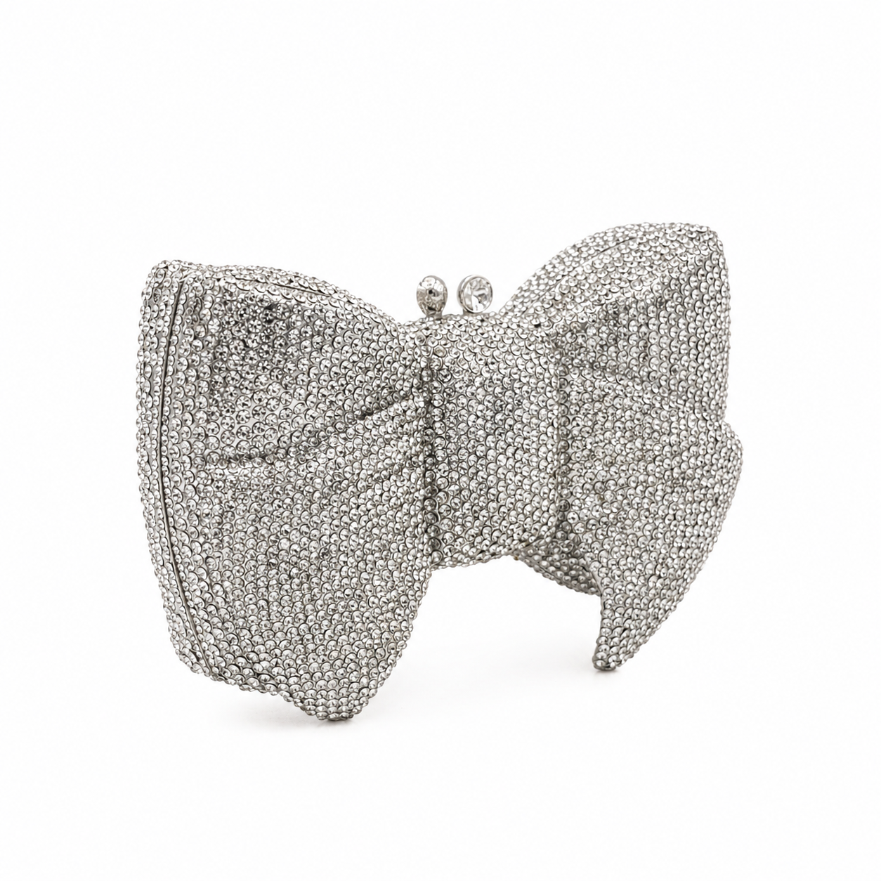 L’APOGÉE Pretty Please Silver bow evening bag featuring rhinestone embellishments designed for weddings, formal events, and glamorous occasion styling.