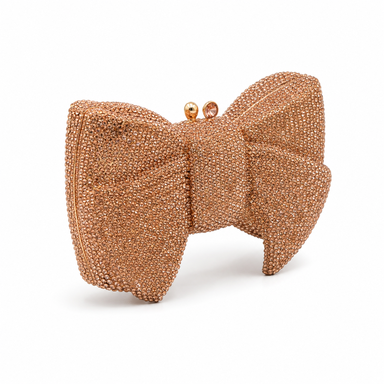 L’APOGÉE Pretty Please champagne bow evening bag featuring rhinestone embellishments designed for weddings, formal events, and glamorous occasion styling.